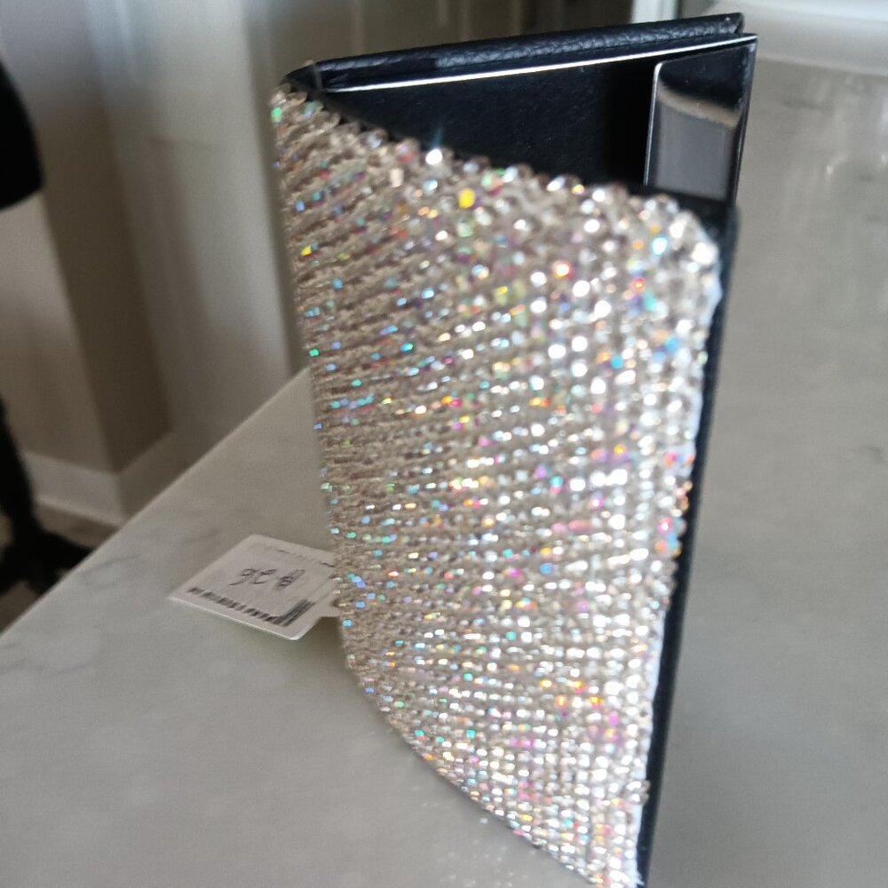 A crystal embellished business card holder in 4 colors